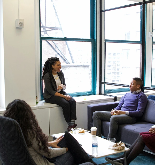 Business leaders in a strategic financial consulting discussion — Protea Consulting Fractional CFO services