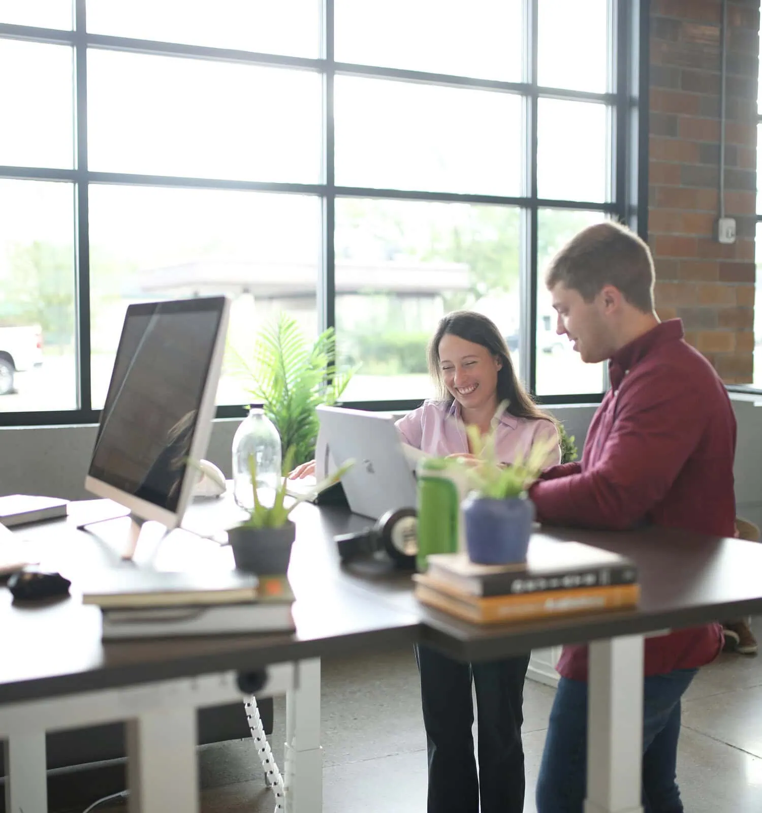 Business professionals collaborating in a bright modern workspace reviewing financial information