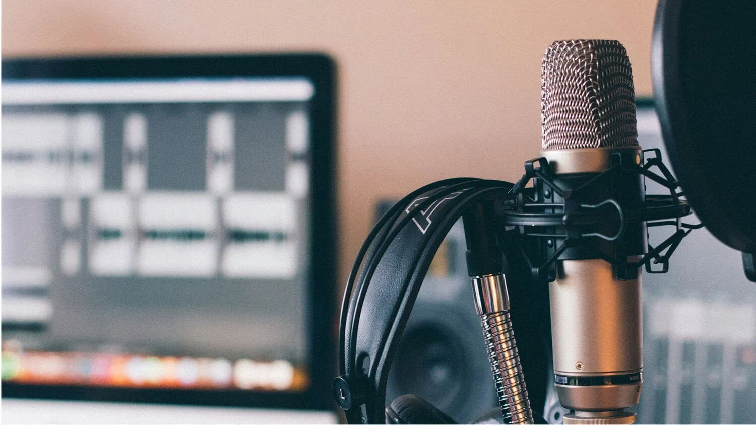 Professional podcast microphone and recording setup for The Unlocking Business Growth Podcast